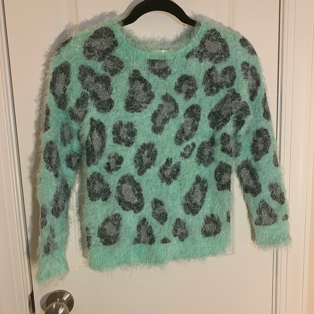 Justice sweater